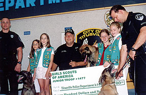 Girl Scouts donate to Titusville PAL