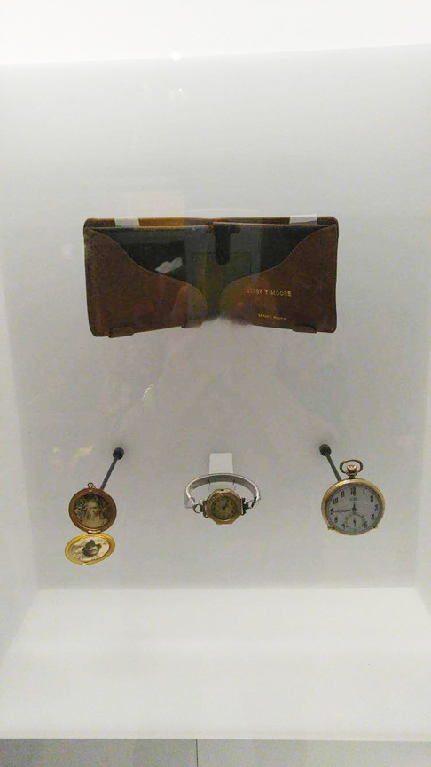 Exhibit of wallet, watches & pendant