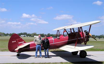 Stearman biplane with pilot & Young Eagle.