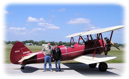 Stearman biplane with pilot & Young Eagle.