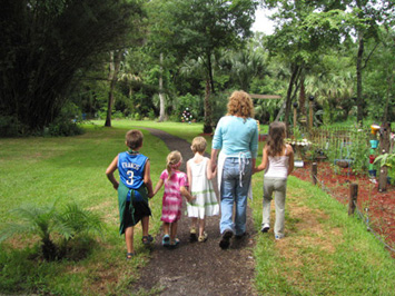 Maxine walking with kids. Maxine walking with kids.