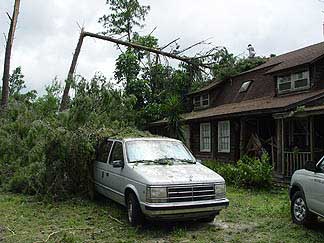 Hurricane Charley damage to car & house.