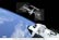 The shuttle approaches the International Space Station