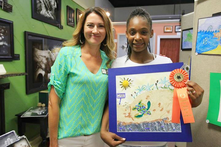 Alaysia Fernandez, pictured with Heidi Thamert of The Downtown Art Gallery.