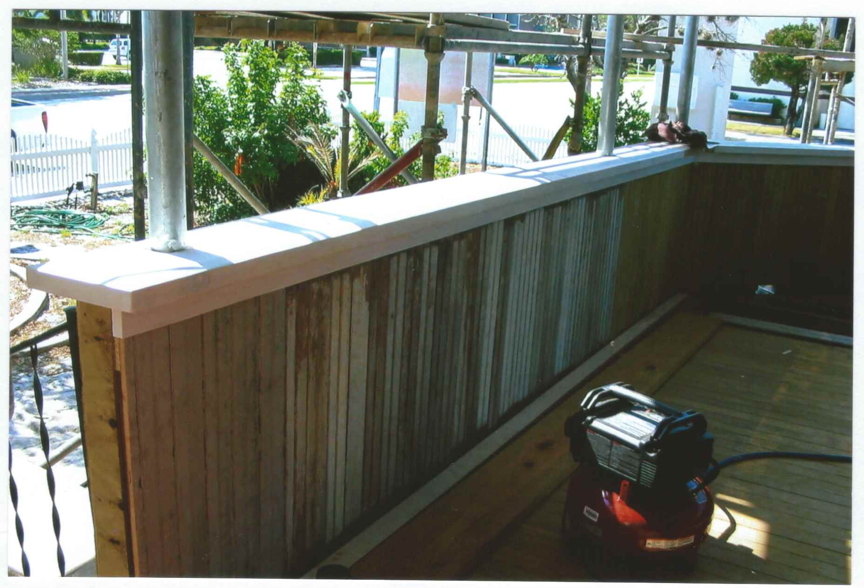 Downstairs porch before refinishing.
