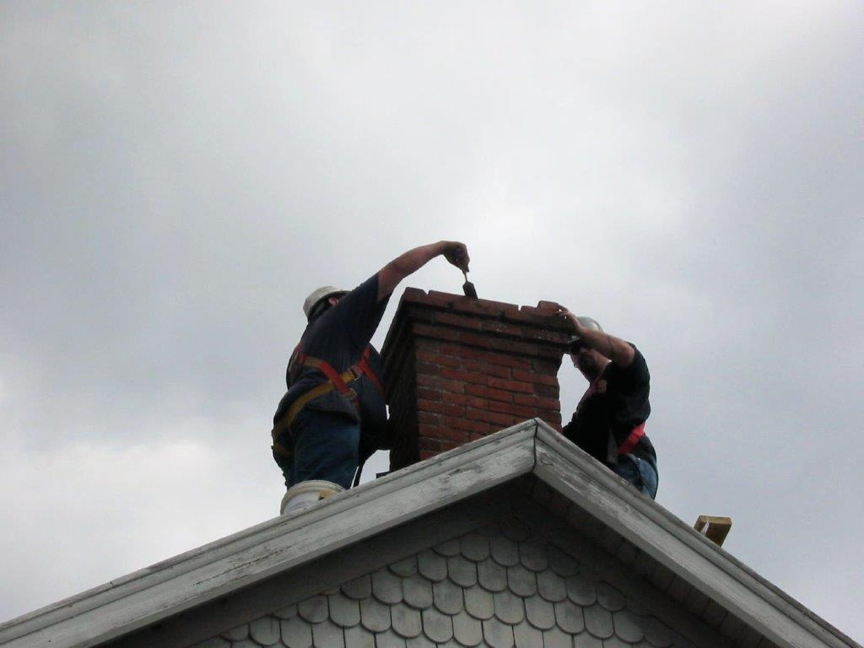 Resetting bricks on west side chimney