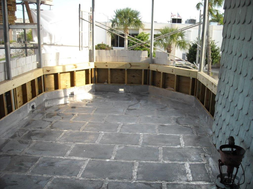 Metal tiled floor on second floor porch Metal tiled floor on second floor porch