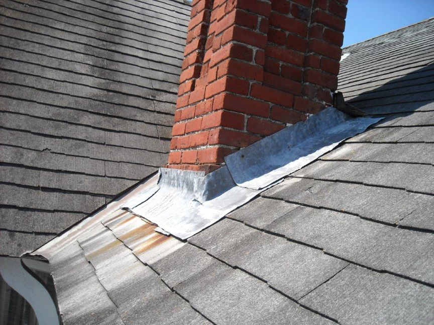 South side Chimney flashing and roof before restoration South side Chimney flashing and roof before restoration