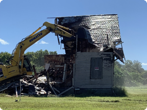 Cleaning out Oliver's Camp before demolition.'